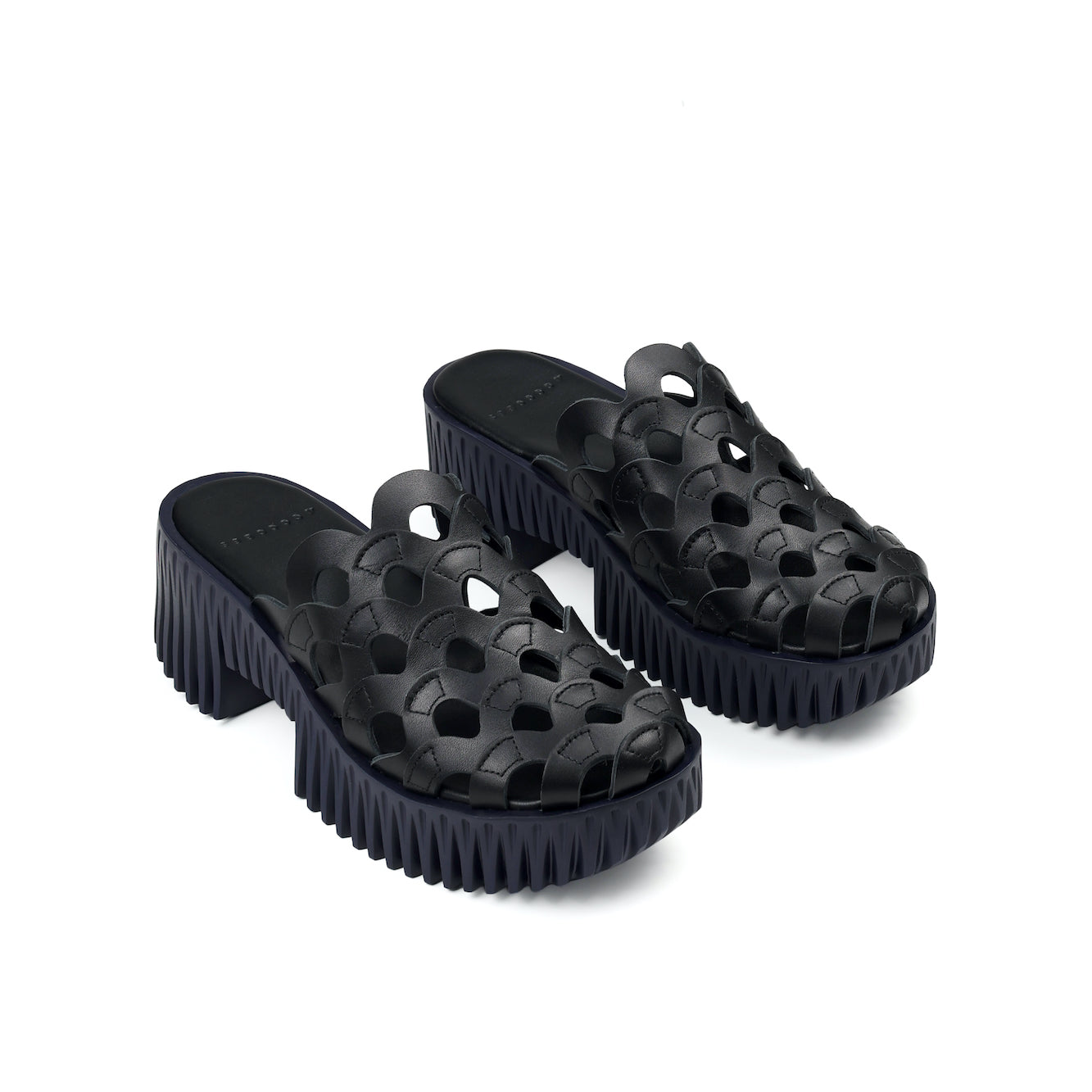 Black fine leather mules with unique platform at 4CCCCEES